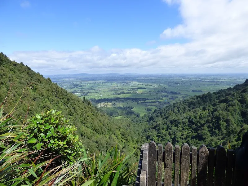 Sweeping panoramic view across the Waikato basin from the top viewing platform of Wairere Falls.