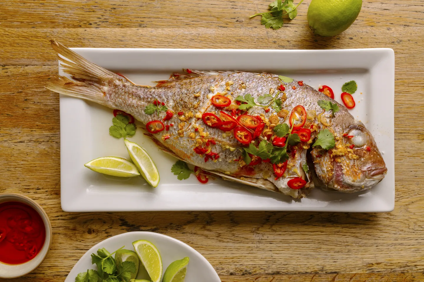 Whole snapper with chilli and lime, a New Zealand seafood dish.